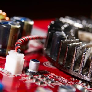 Microprocessor with motherboard background. Computer board chip circuit. Microelectronics hardware concept.
